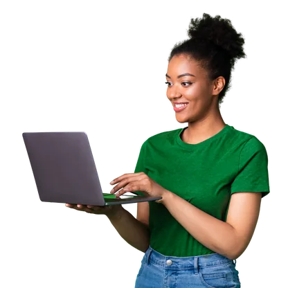 Smiling woman in a green top working on a laptop